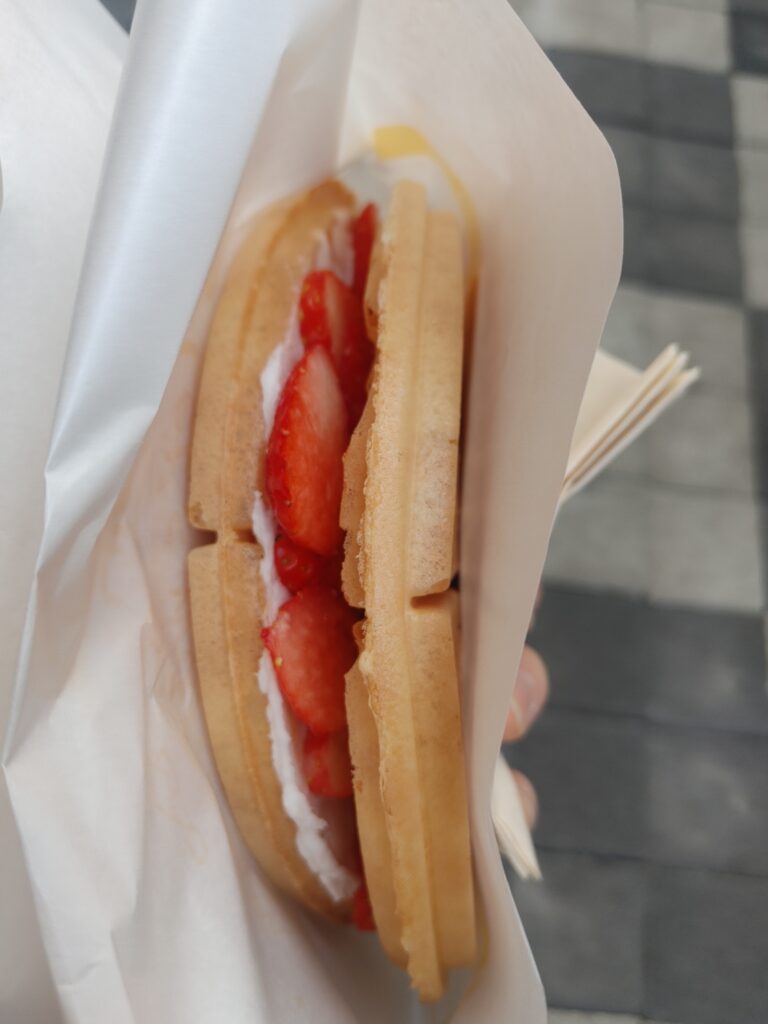 Soft Korean waffle with fruit and cream topping