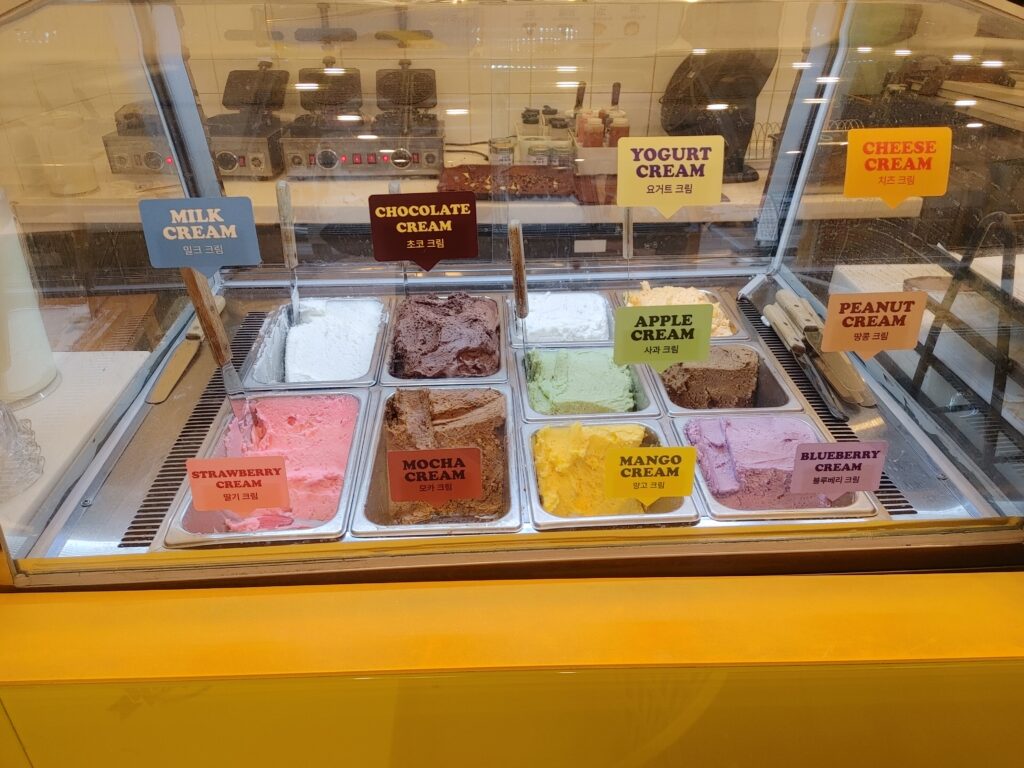 Soft Korean waffle with fruit and cream topping
