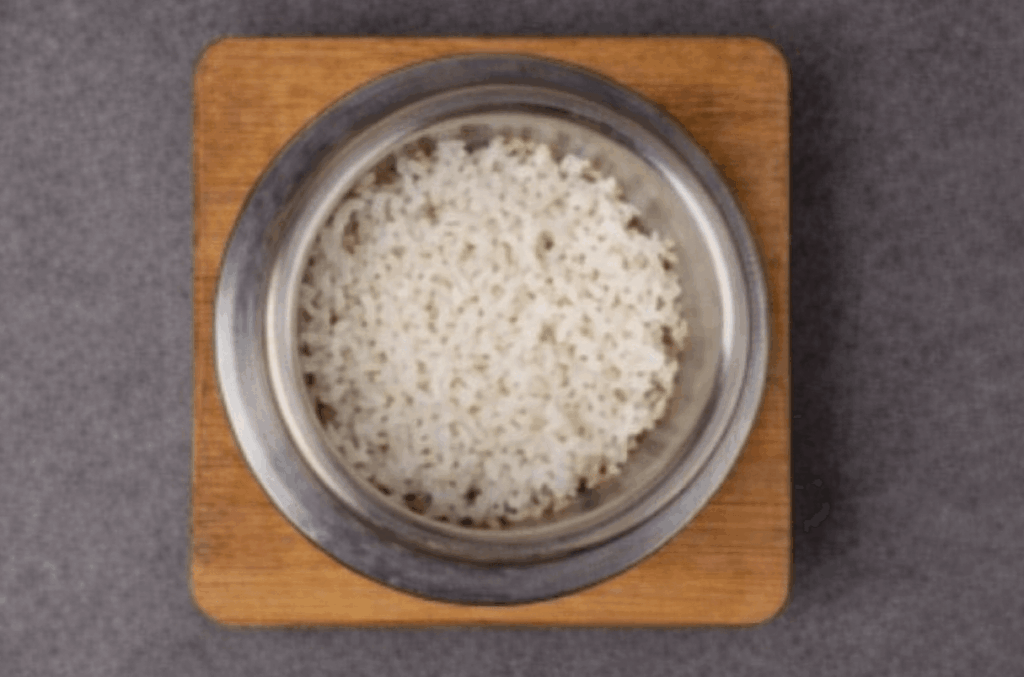 Korean Sotbap Rice Cooked in Hot Stone Pot at Traditional Restaurant in Seoul