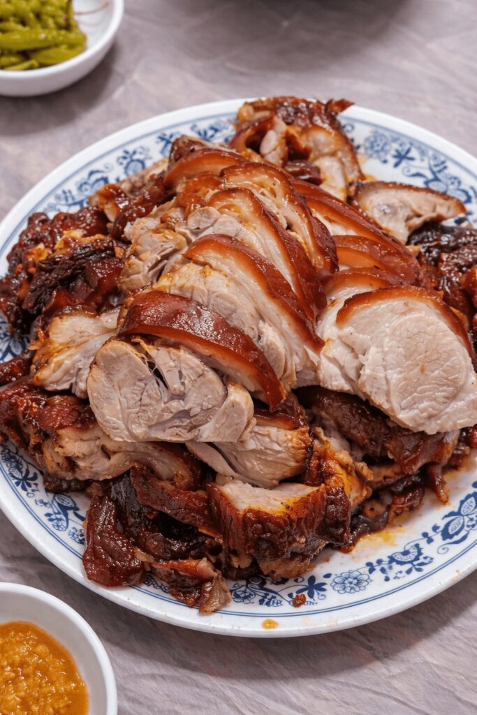 Large plate of traditional Korean jokbal pork hock at Halmaejip Jongno restaurant