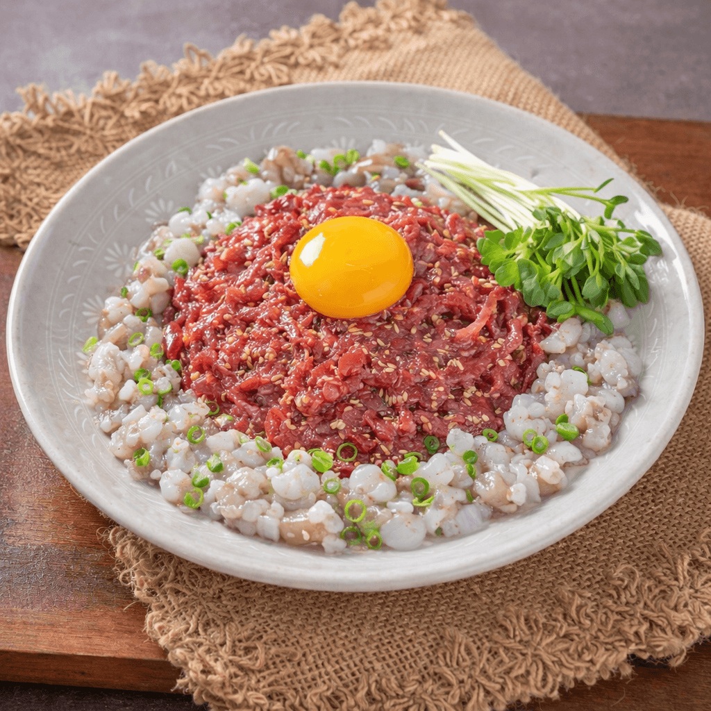 Buchon Yukhoe nakji tangtangi yukhoe raw beef with octopus at Gwangjang Market Seoul