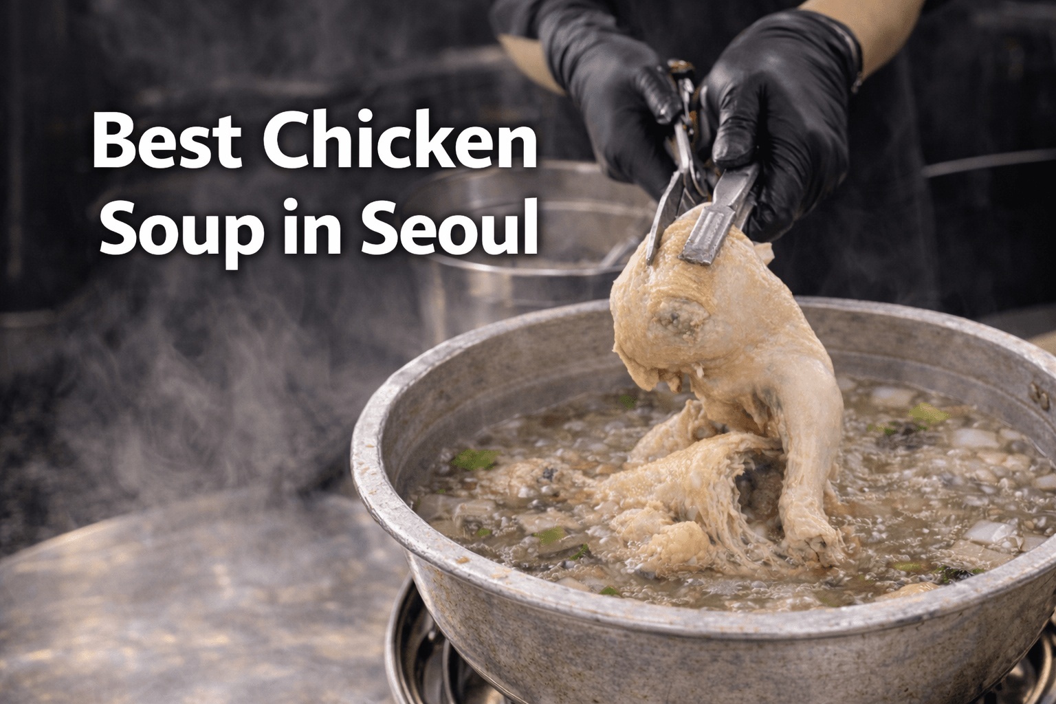 Whole chicken being lifted from dakhanmari soup in Jongno Seoul