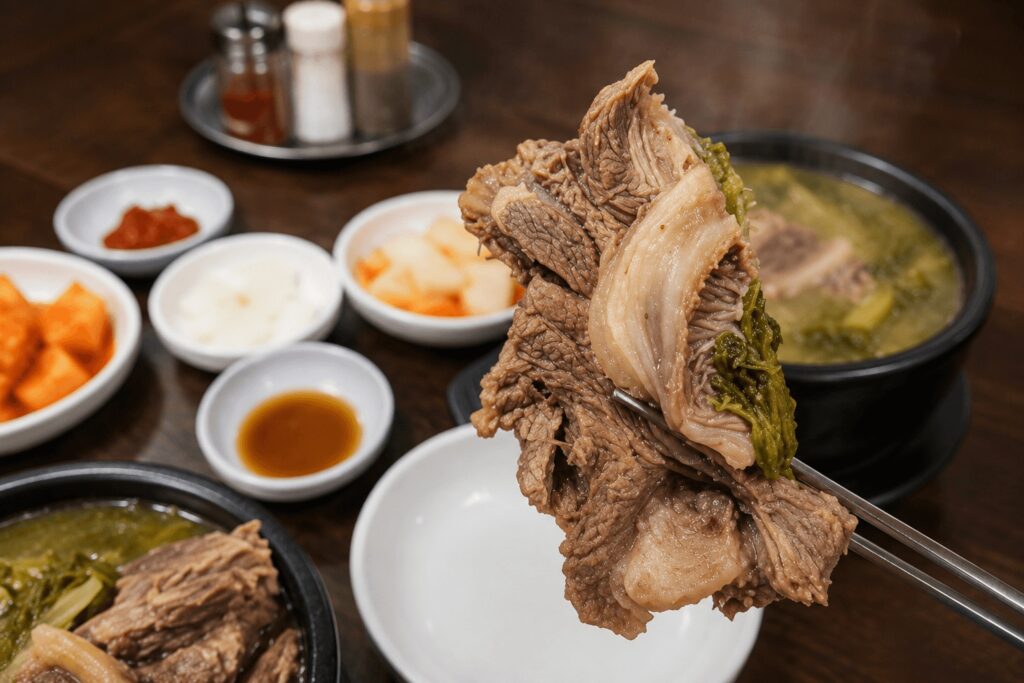Close-up beef bone haejangguk with napa cabbage in Seoul