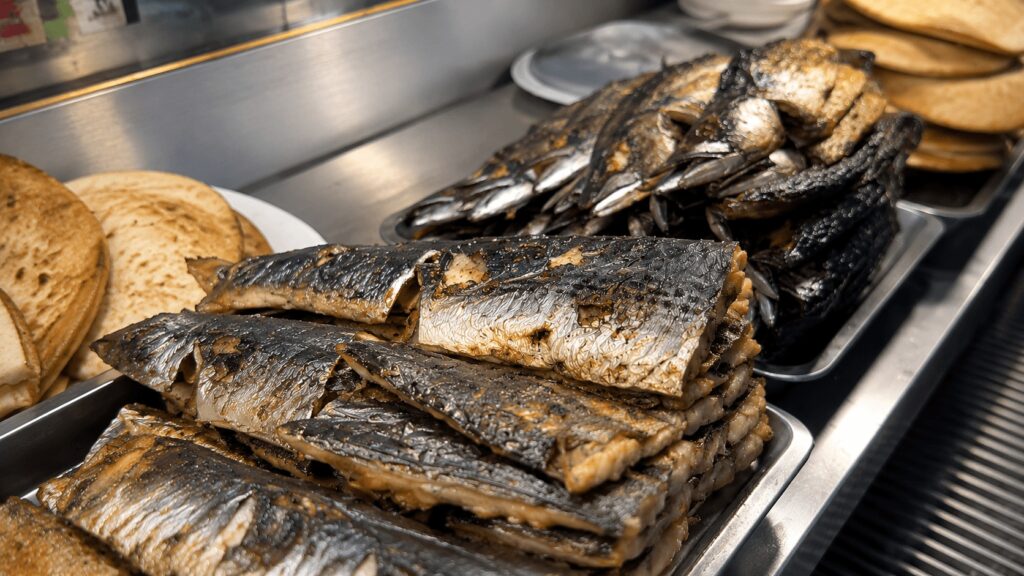 Fresh charcoal grilled mackerel at Dongdaemun grilled fish alley