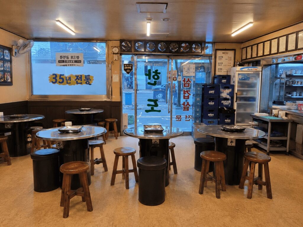 Retro interior and seating area of Hando Samgyeopsal Korean BBQ restaurant in Jongno