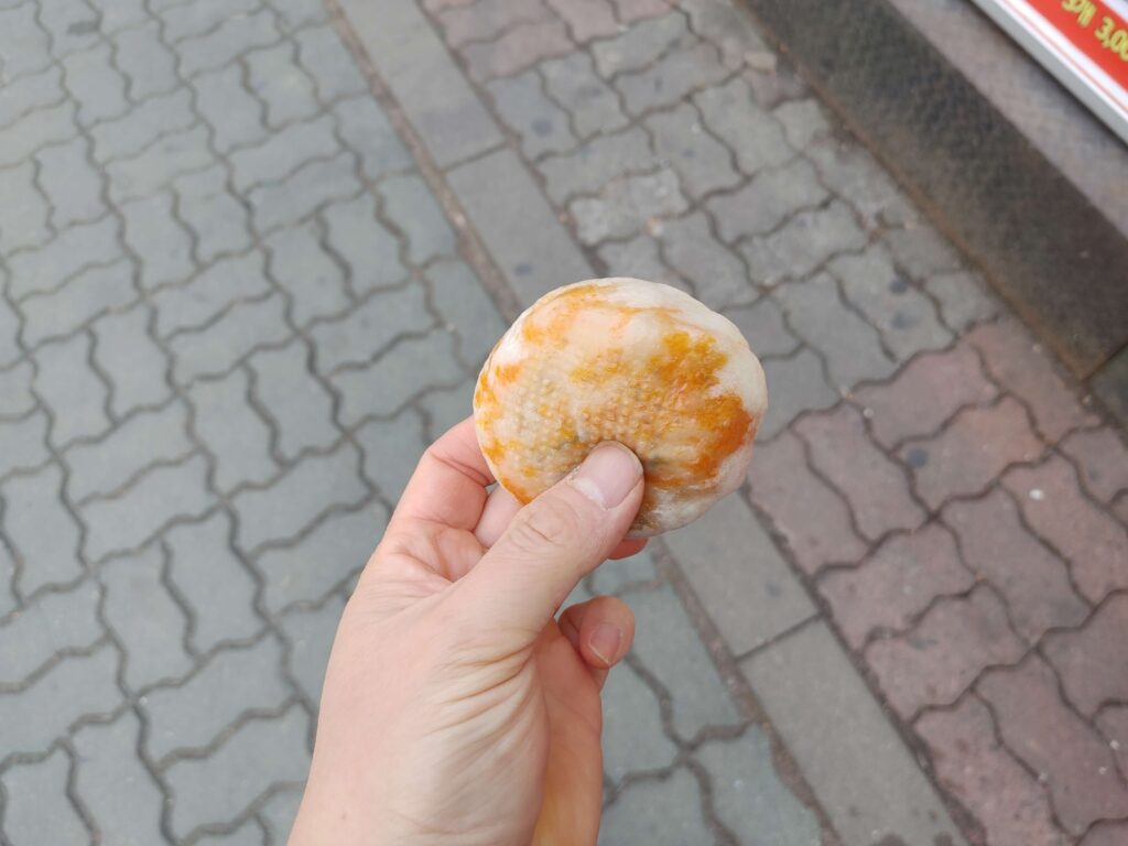 Inside of kimchi wang mandu with spicy filling Korean dumpling