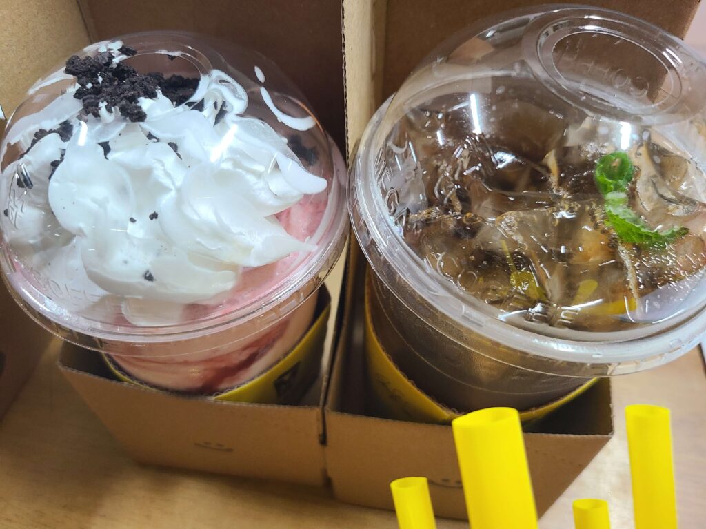 Strawberry drink and iced Americano from Mega Coffee Seoul