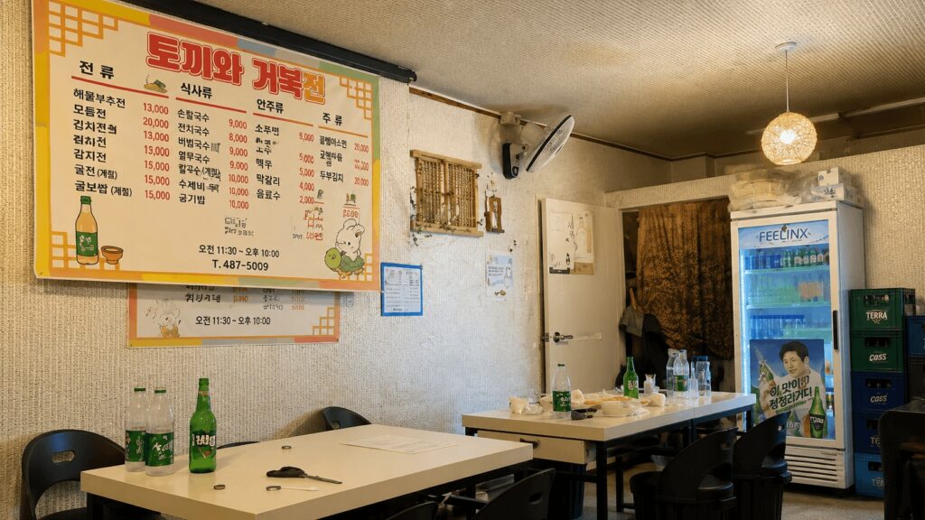Cozy interior of a traditional Korean jeon restaurant in Seongsu serving pancakes and makgeolli.
